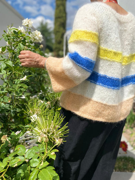 White circular sweater with stripes