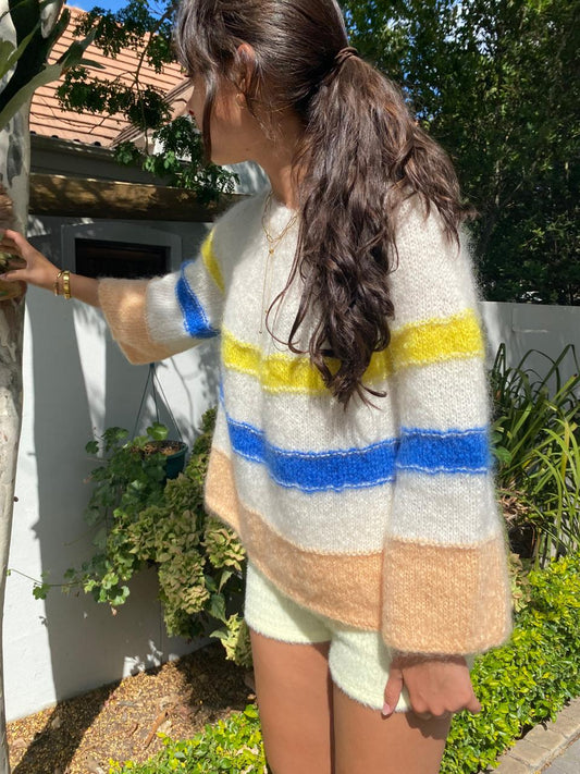 White circular sweater with stripes